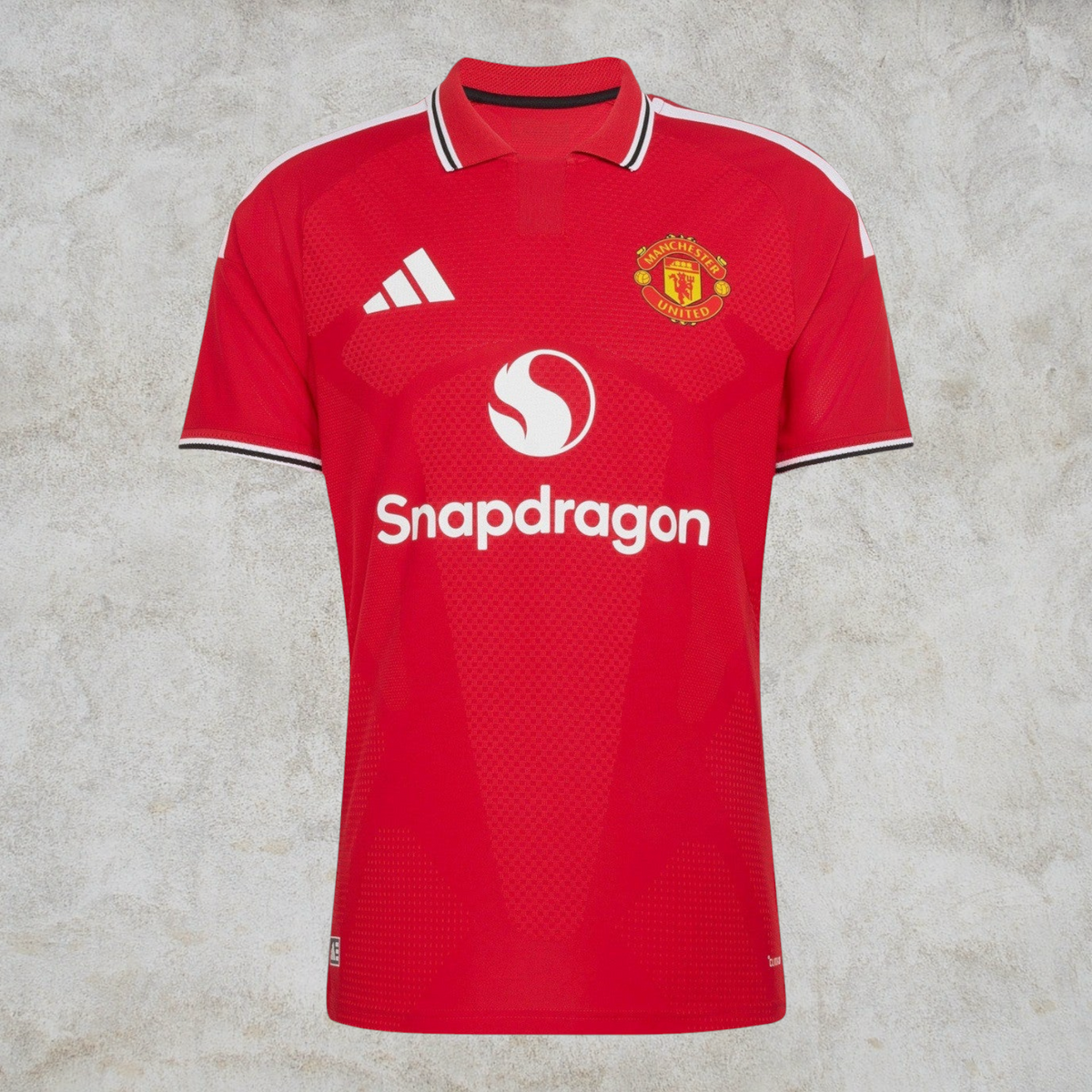 Malvros Manchester United red performance soccer jersey with white sponsor logo, club crest, and polo collar