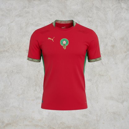 Malvros Morocco national team red soccer jersey with green accents, gold Puma logo, and embroidered team crest.